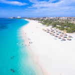 palapas-on-eagle-beach-scaled